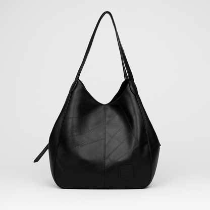 Avril Elegant taske i imiteret læder